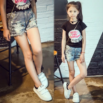 2018 Yeni Yaz yeni kızlar şort Koreli çocuk vahşi suyla delikleri moda inci şort denim. Uygun: 3 5 7 8 10 12 14 yıl