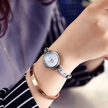 Mükemmel Kalite Marka Yeni Moda Kadın Lüks Bilezik İzle Sony Ericsson için Mujer Saat Yılbaşı Hediyesi Sony Ericsson için hombre Kol saati Saatler